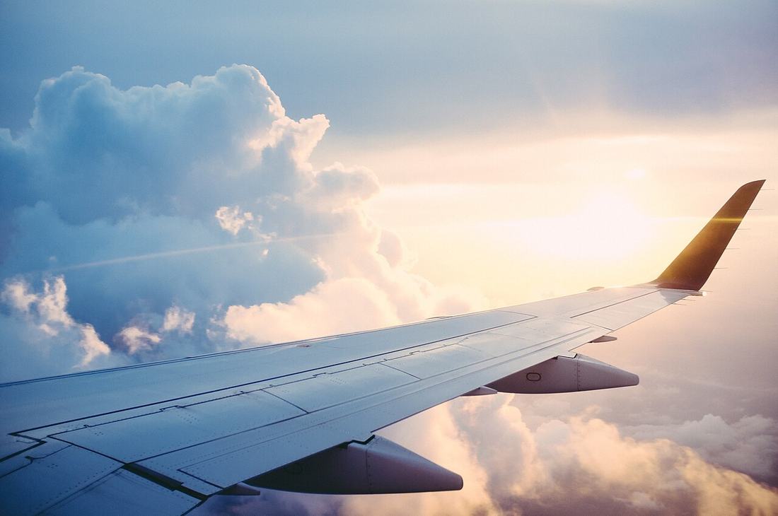 An airplane wing seen from a window