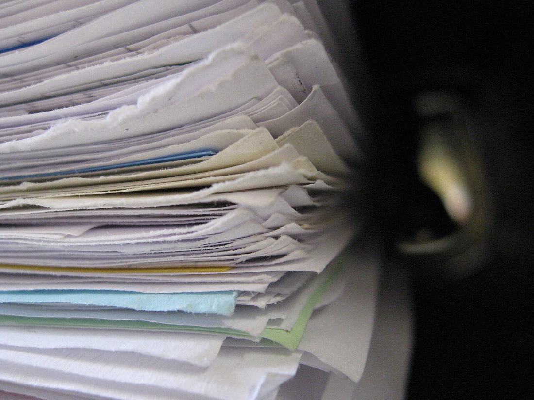 A stack of document folders