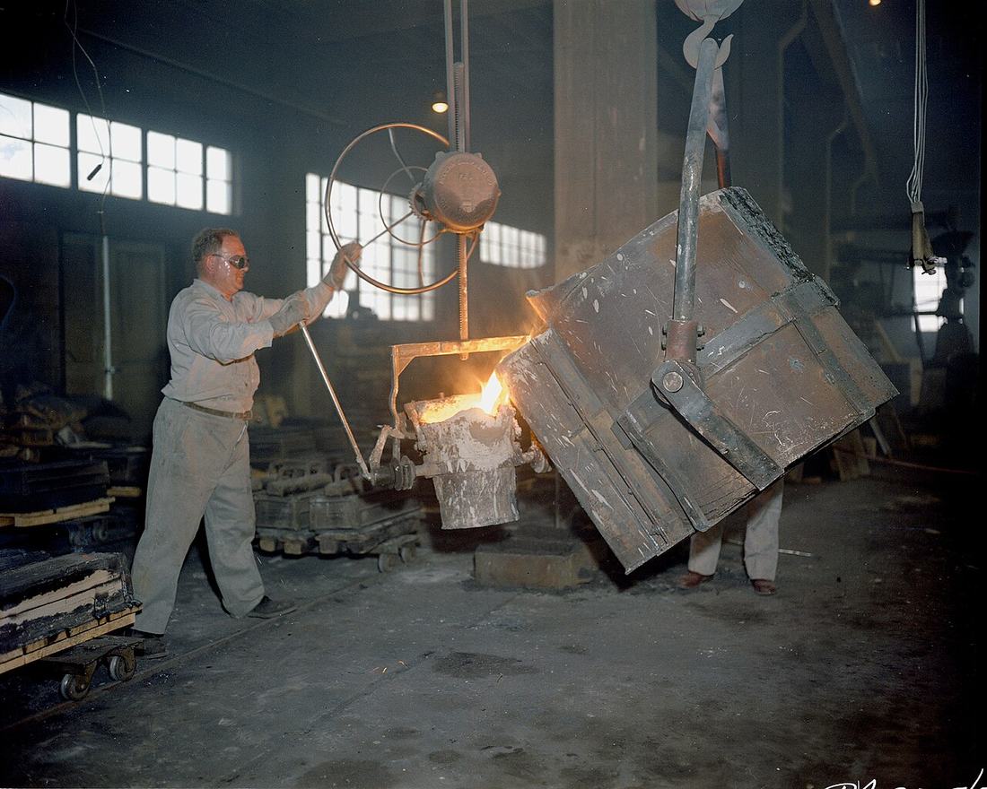 Steel workers in a factory